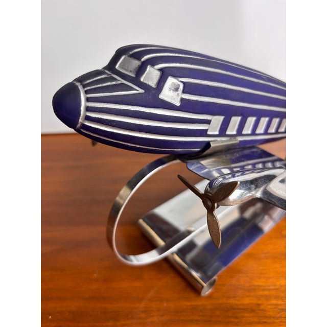 Iconic Art Deco Table Lamp with it's original Blue glass shade and silver paint. Lamp has been rewired in last 10 years or...