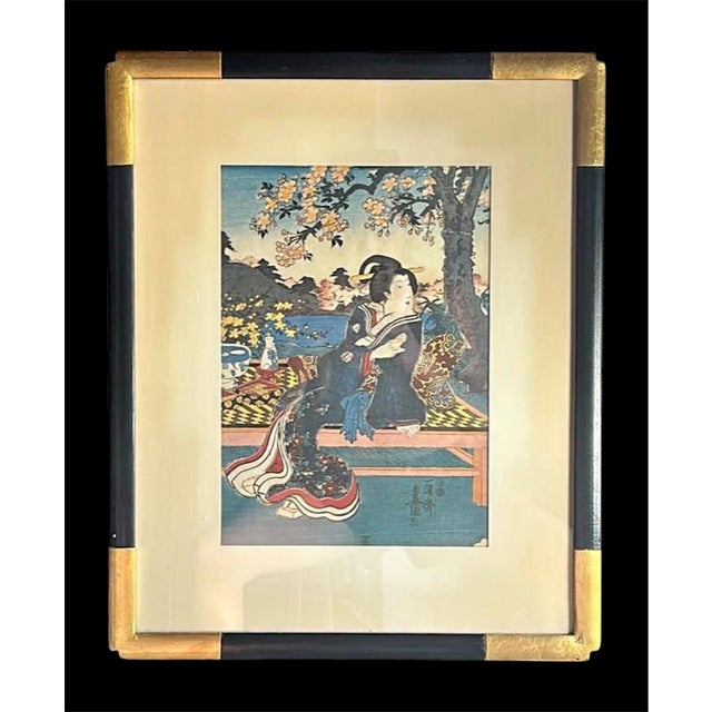 This Utagawa Kunisada (Toyokuni III) woodblock print, titled "Flowers" or "Bijin under cherry blossom tree," is a...