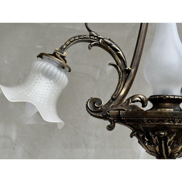 Add a touch of timeless elegance to your space with this stunning antique bronze chandelier. This exquisite ceiling...