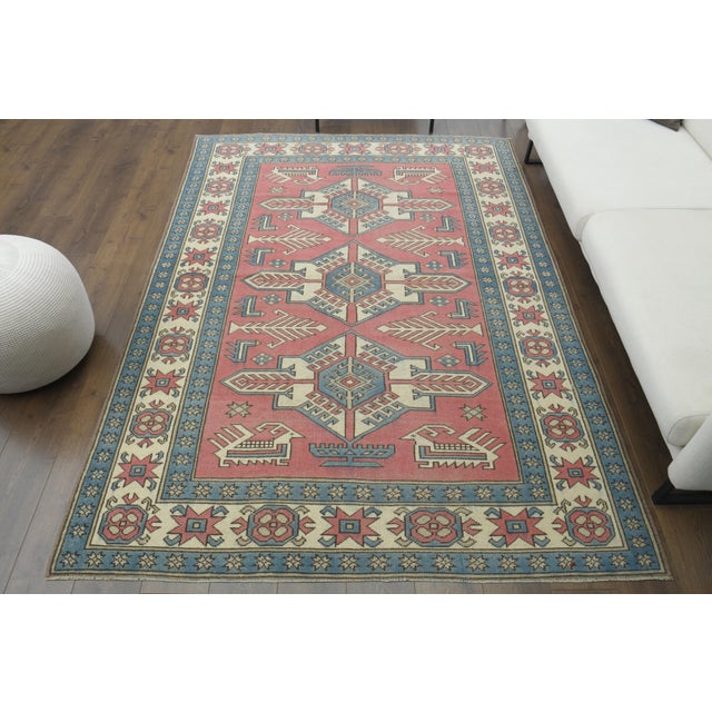 Vintage Turkish Hand-Knotted vintage rug is a semi-antique vintage area rug.'70s Eastern region of Turkey's unique rug is...