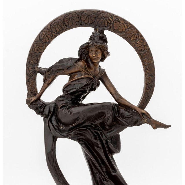 Art Nouveau Style Venus on the Moon Patinated Bronze Sculpture, signed "Collett" in gilt to circular base, atop a black...