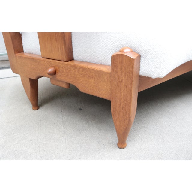 Modernist oak sofa designed by Guillerme et Chambron for the French company "Le mobilier Votre Maison". Solid Oak frame...