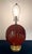 This striking piece is a masterclass in Postmodern geometry, featuring a bold, oversized scallop shell silhouette that...