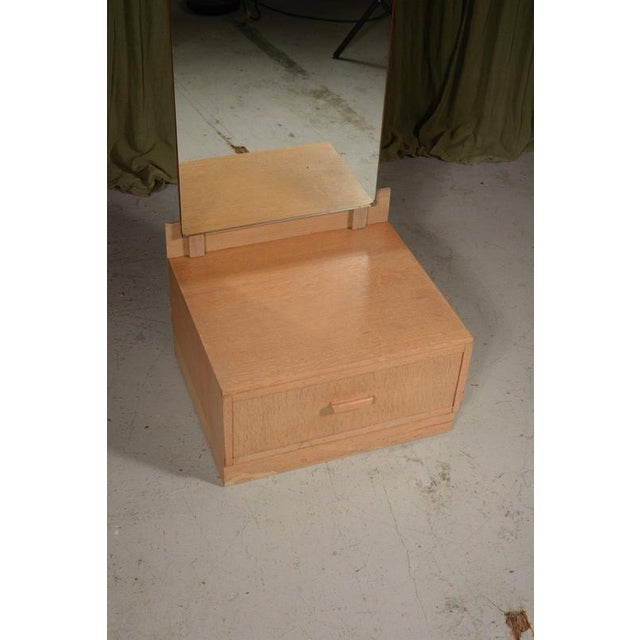 A stylish quarter sawn pale oak cheval dressing mirror, with a drawer to the base, made in the style of the Heal’s...