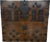 This piece is a large Antique Korean Bandaji storage chest, made of warm-toned hardwood with extensive black iron...