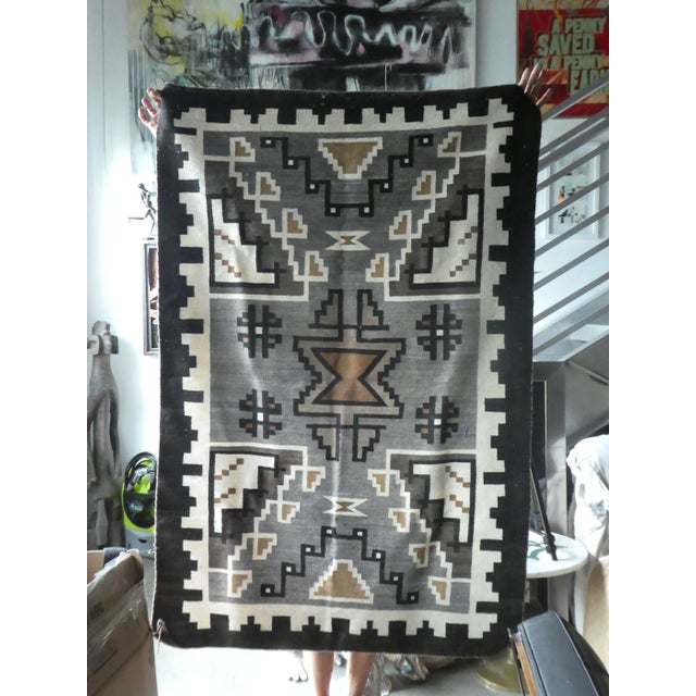 Early 20th C Antique 2 Grey Hills Navajo Rug sold as found in vintage condition without any tears rips. Rug may have been...