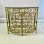 A stunning metal Silver Leaf finished 30-Well Wine Rack Console Table with a beveled glass top. The table has lost its...