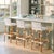 Combining clean lines with tropical materials, this Butler Specialty Company low back bar stool brings modern island charm...