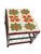 A striking handcrafted Yoruba nobility table from Nigeria, featuring a solid wood base adorned with vibrant trade glass...