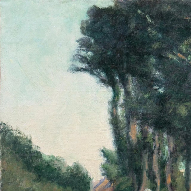 An early twentieth-century, American Impressionist School oil landscape showing a sunlit view of a woman standing on a...