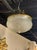 The French Cut Glass and Gilt Brass Flush Mount Chandelier is a sophisticated and elegant lighting fixture that brings a...