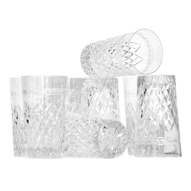 Set of 8 Wedgewood crystal drinking glasses feature a classic heavy diamond cut pattern below the oval cut band detail...