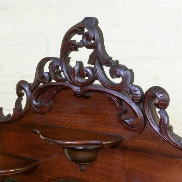 This is a Victorian walnut chiffonier side cabinet with a strong Rococo influence to its design. Because some prefer to...