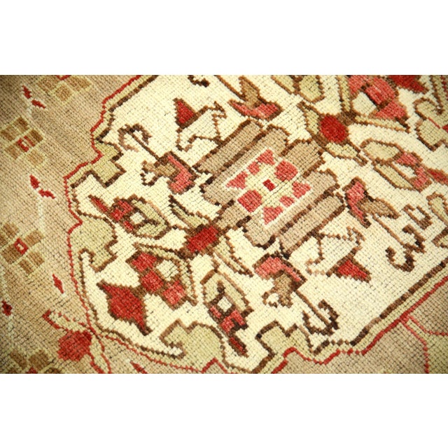 Introducing a one-of-a-kind vintage Turkish hand-knotted wool rug, carefully crafted by skilled artisans using traditional...