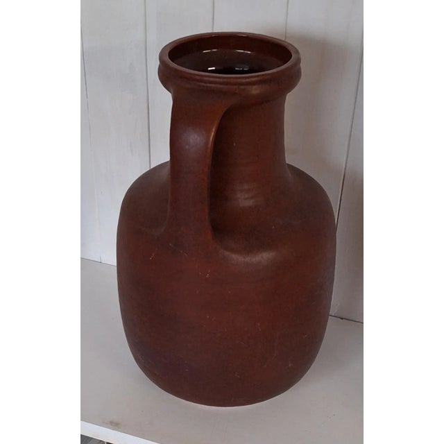 German Brown Glazed Ceramic Handle Vase from Carstens, 1970s, in Very Good conditions. Designed 1970 to 1979 This piece...