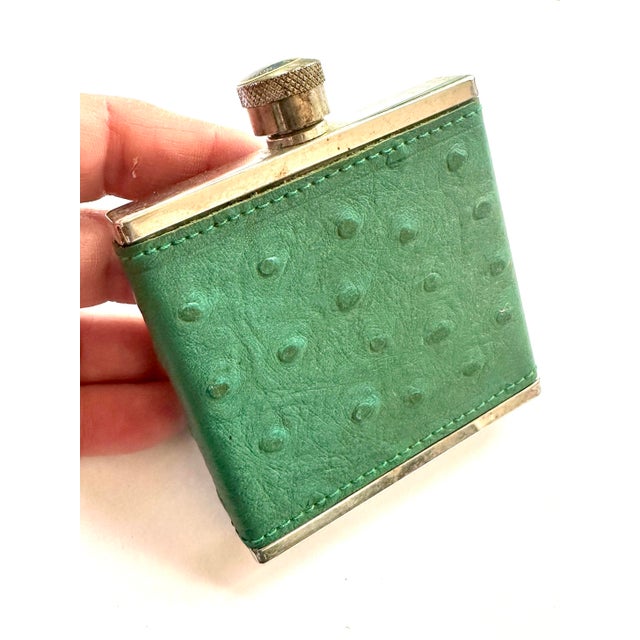 This pocket/purse sized flask dates from the late 1980's. One owner. By Sir Rondo's, genuine 100% ostrich leather wrapped...