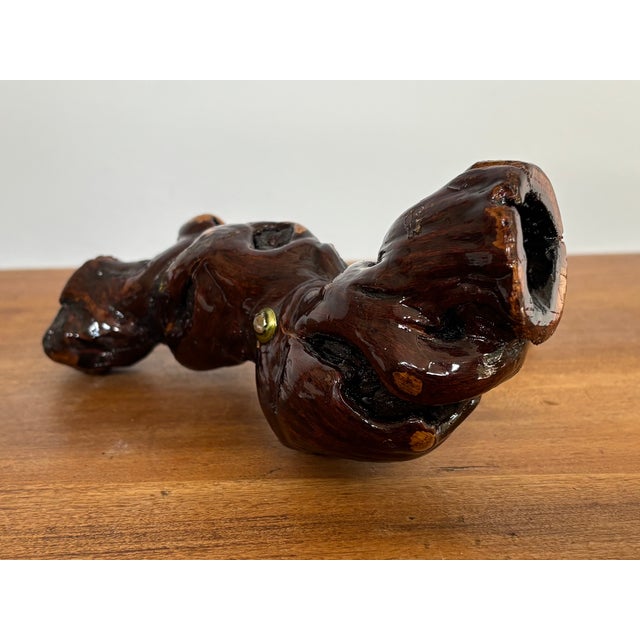 Corkscrew wine bottle opener made from the wood fragment of a vineyard vine and finished with a high gloss varnish. A...