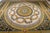 Vintage Aubusson in the grand Empire style. A great round medallion with a sunburst rosette at its centre is ringed by...