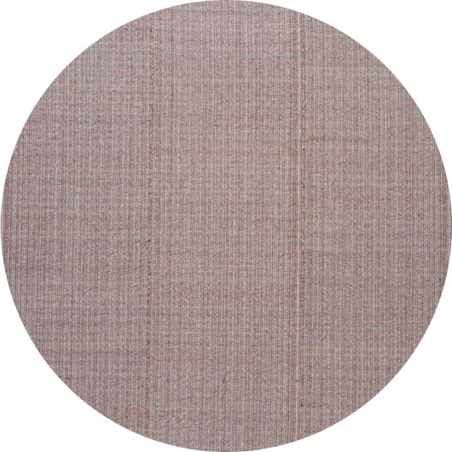 A beautiful mid-20th century flat-weave rug with an all-over gray motif. This piece has fine details, great colors, and a...