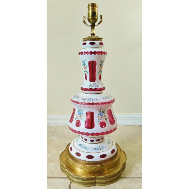 Beautiful vintage mid century bohemian ruby red cased art glass and brass floral lamp. Just Gorgeous! Circa 1940s - Made...