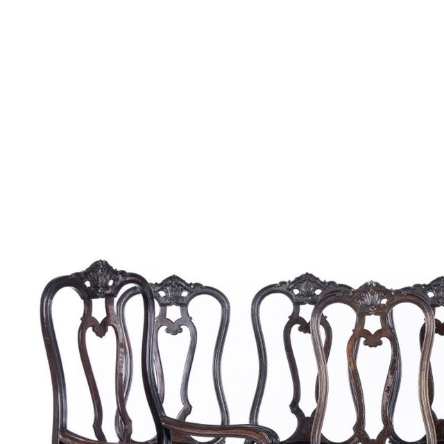 Furniture - Set of two armchairs and seven chairs; in fine wood. Portuguese; 20th century in fine wood. Open backs;...