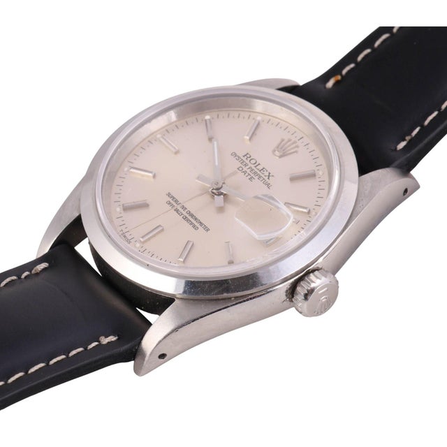 Classic Rolex Oyster Perpetual Date 15200 automatic watch in stainless steel featuring a 34mm case with clean silver dial,...