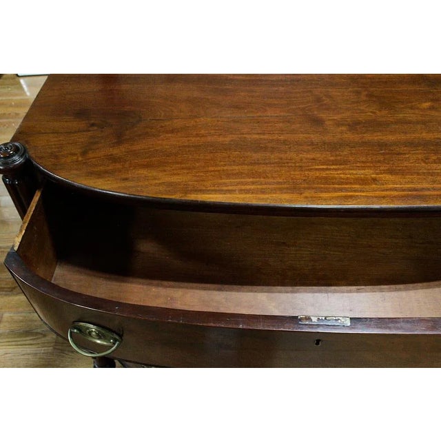 This antique early 1800s American mahogany chest of drawers is a beautifully crafted piece that exudes old-world charm and...