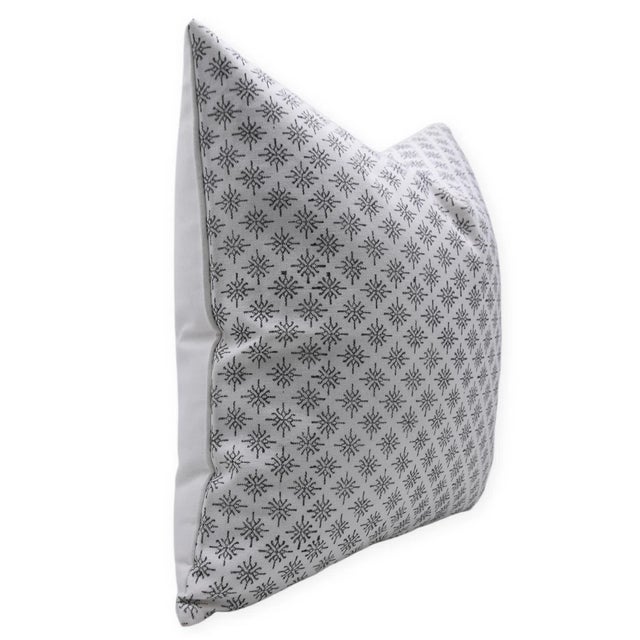 Elevate your home with the charm of traditional craftsmanship. This block print handmade cushion cover, crafted from thick...