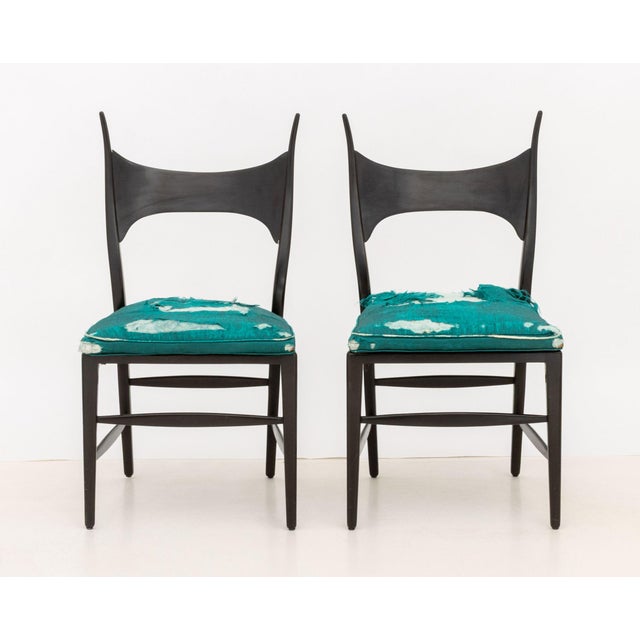 Pair of Edward Wormley for Dunbar "Antler" Chairs, each with ebonized wood frame and green silk upholstery. 36" H x 19" W...