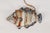 A trio of mid-century French majolica fish wall plaques from Vallauris, hand-glazed in gorgeous tones of blue, brown, and...