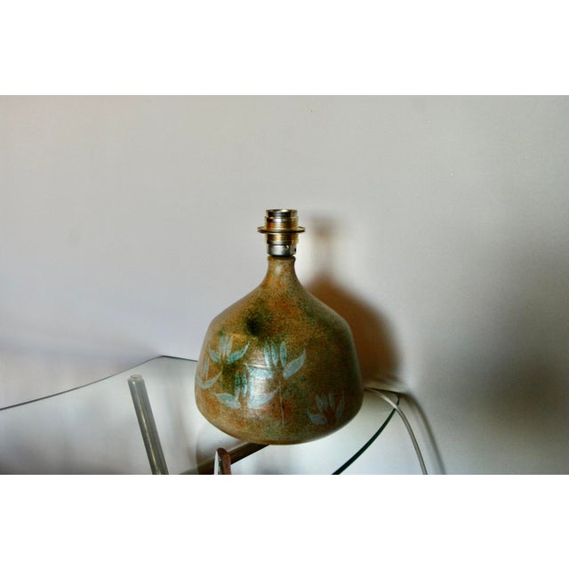 Danish ceramic table lamp sold without a lampshade, in good working order, original wiring This piece has an attribution...