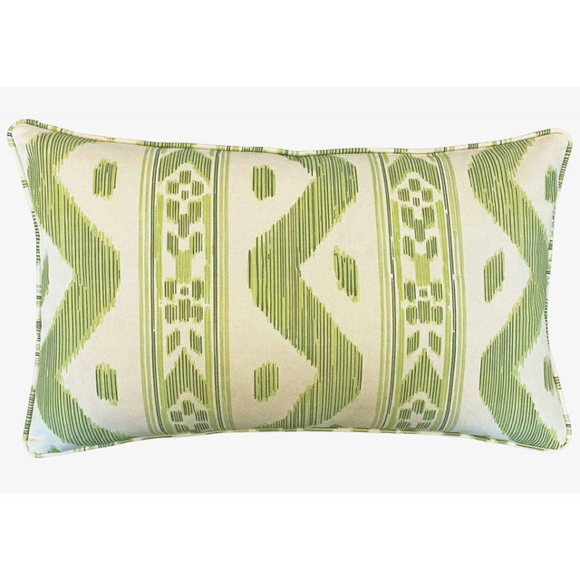 Presenting an exciting new design, this reversible ikat pillow is poised to become a captivating focal point in any home...
