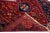 Beautiful Vintage Shiraz hand-knotted Wool rug with the red field. This Shiraz rug has a multicolor accents in all over...