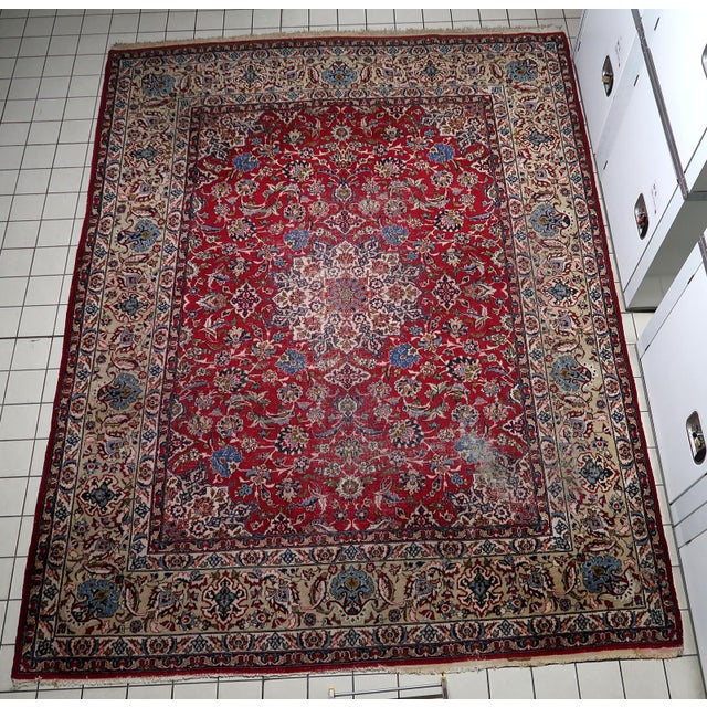 Antique Persian Tabriz Rug from the 1900s A magnificent antique Persian Tabriz rug from the early 1900s, representing over...