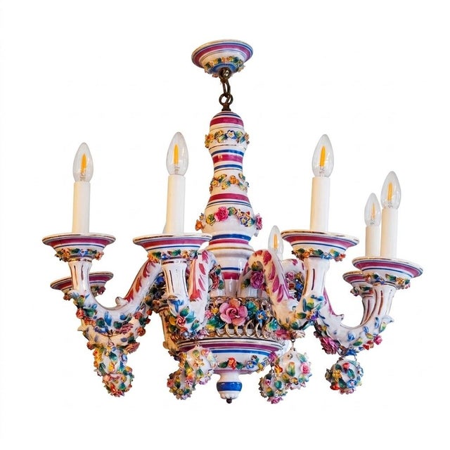 An elegant Italian six-light chandelier, crafted from finely modeled and hand-painted white porcelain in a delicate...