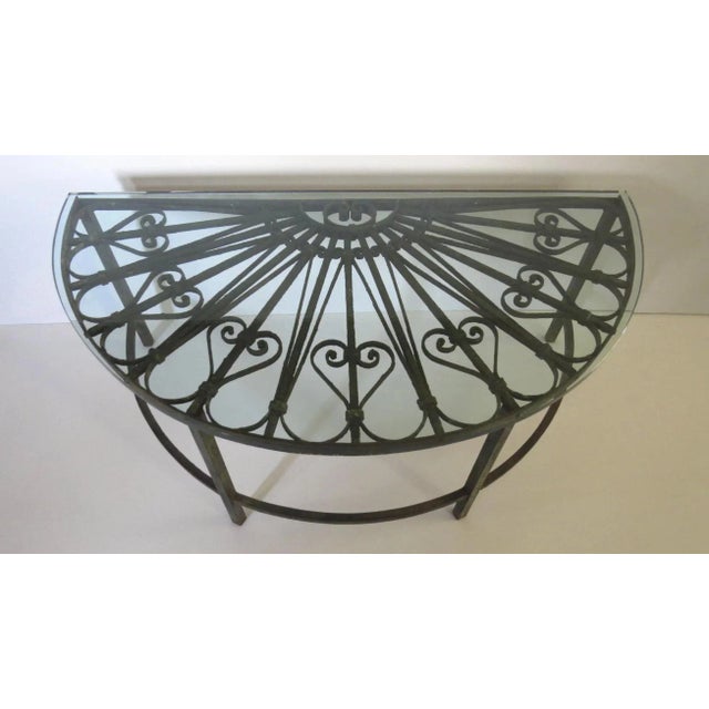 Old painted architectural transom now as a coffee table. Measures 51" wide at back, 26" deep, and 20 1/2" tall. Glass has...