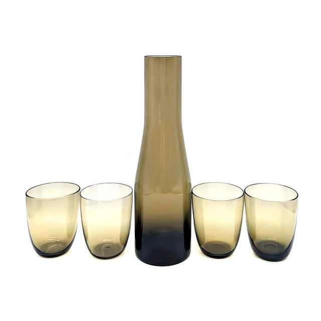 Offered is a circa. 1980s Scandinavian smoke brown blown-glass carafe with four low-ball tumblers, perfect for Sangria,...
