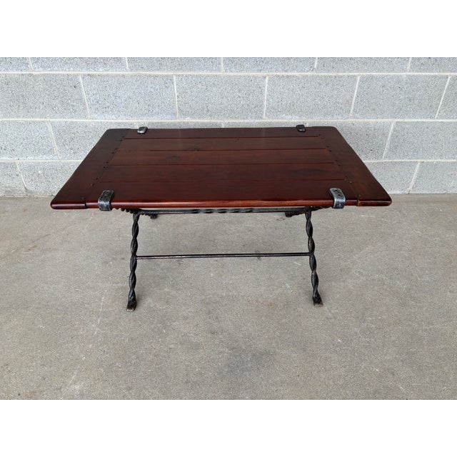 Description: Spanish Revival Style Cherry & Cast Iron Coffee Table. In Good Vintage Furniture Condition. Original Finish....