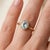 Oval Aquamarine Solitaire Ring in Gold Light, serene, and beautifully understated, this ring features a tranquil oval-cut...
