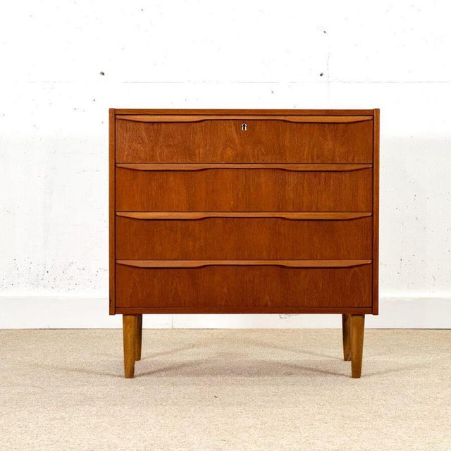 Johannes Larsen designed this beautiful chest of drawers in Denmark during the 1960s. Crafted with exceptional attention...