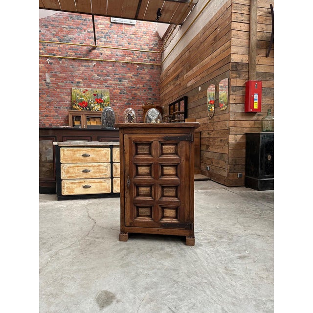 This vintage brutalist piece of furniture in solid elm, dating from the 1950s, has been completely restored. It has a...