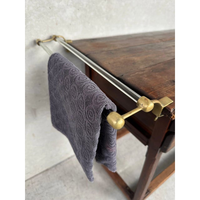 Original Art Deco towel holder in copper and glass. Easily mounted to the end of a tabletop using copper (wing) nuts....