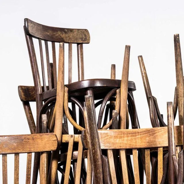 1950’s Dark Oak Bistro Bentwood Dining Chairs. Good quality classic bentwood chairs with a deep dark oak colour and...