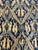 This remarkable antique Chinese rug from the early 20th century, circa 1900s, measures approximately 11'8" x 9'2" and...