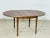 For sale is this beautiful vintage dining table, distinguished by its round shape and particularly warm wood grain. It can...