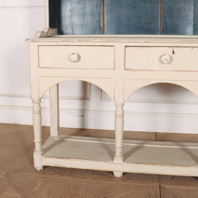 Good 19th century Welsh pine potboard dresser. 1860. This piece is designed in the style of the selected designer and/or...