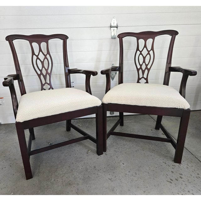 Classic Chippendale style arm chairs. Set of 6 chairs. The chairs are in very good condition. There are a few blemishes,...
