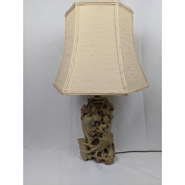 An exceptionally detailed vintage Chinese table lamp fashioned from a substantial hand-carved soapstone vase. Dating to...