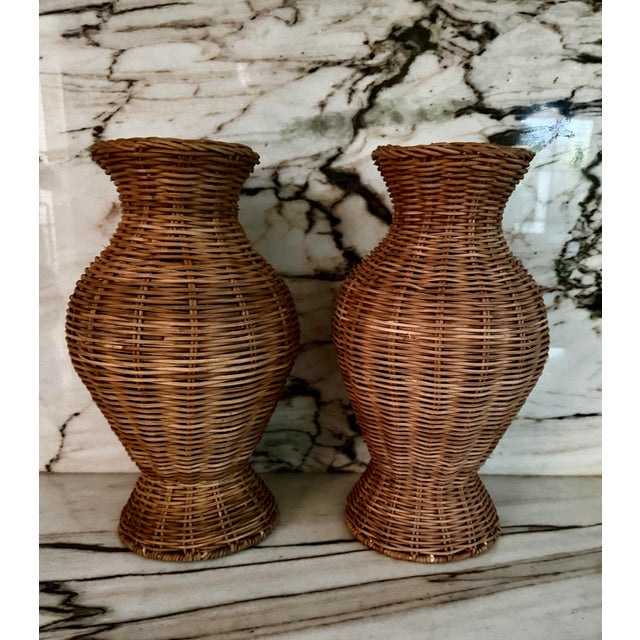 Pair of handwoven, made in Vietnam natural rattan vases.