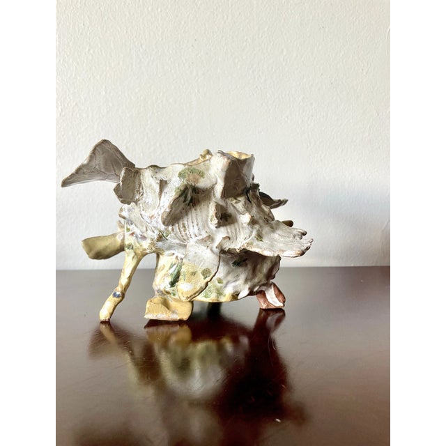 Beautiful and unusual sculpted cup or vessel. Fantastic detailing with barnacle-like and coral-form elements on an...